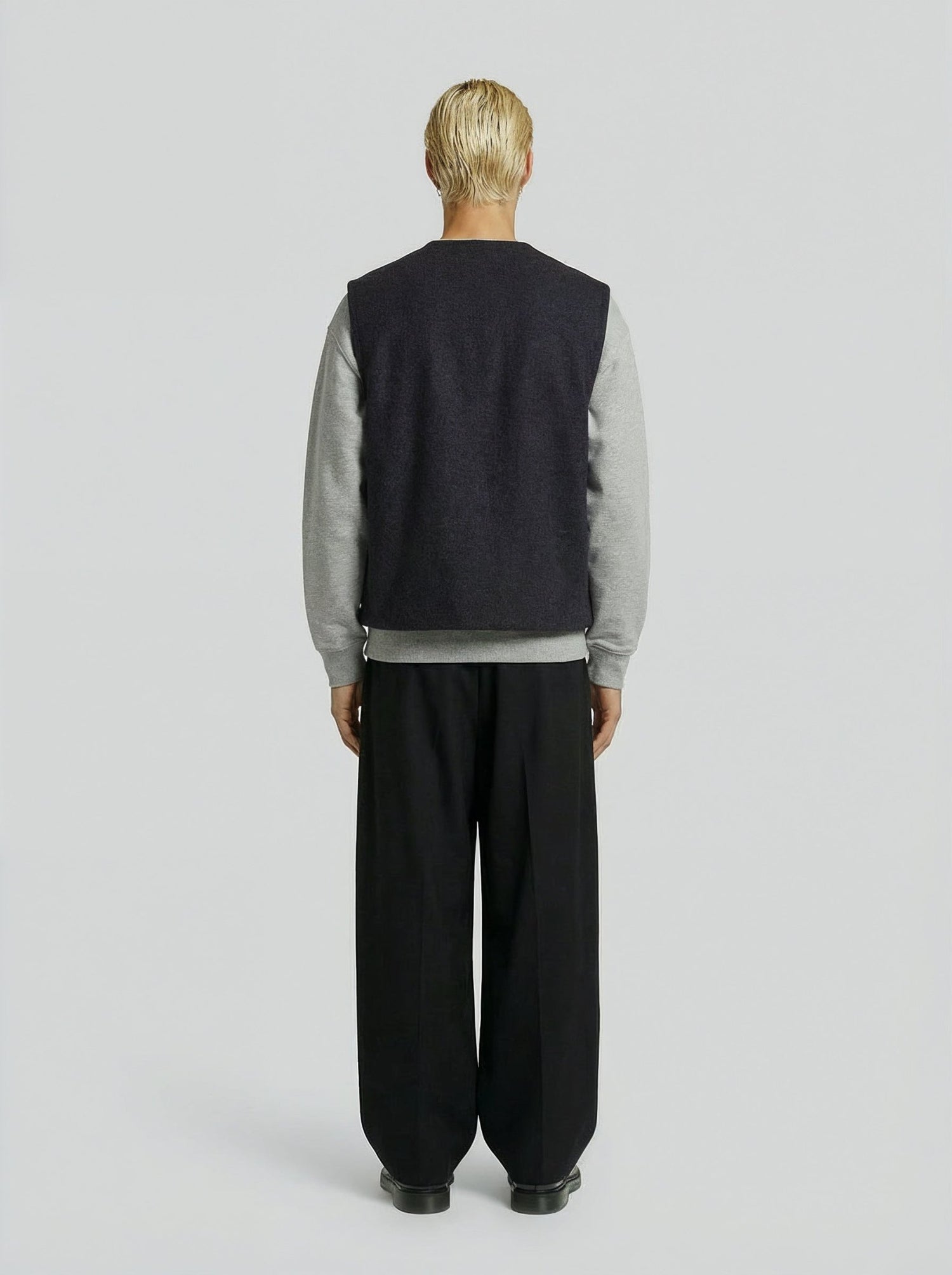 LA VESTE SANS MANCHES GRISE EN LAINE