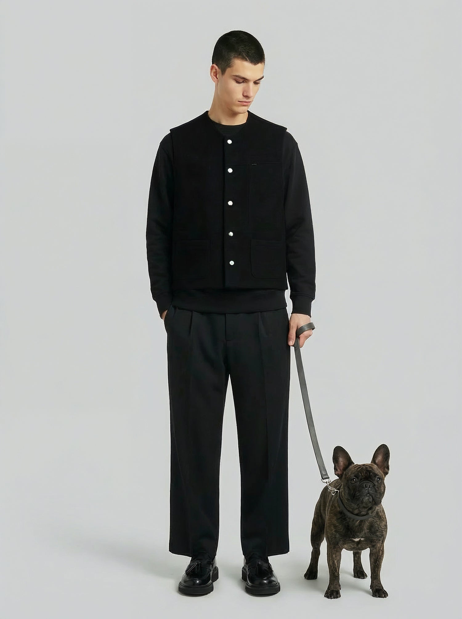 LA VESTE SANS MANCHES NOIR EN LAINE